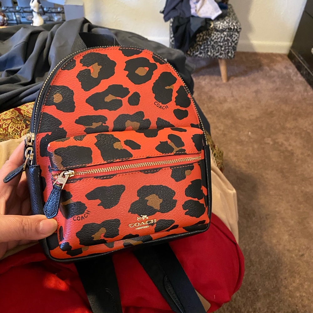Coach red ocelot backpack purse. like new